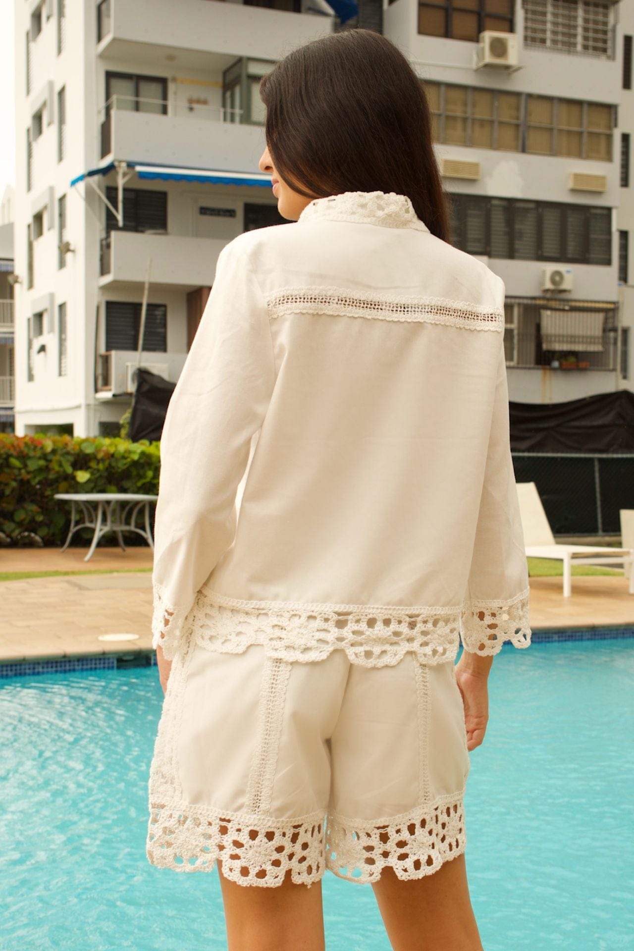 Back view of white set showing lace trim and relaxed fit
