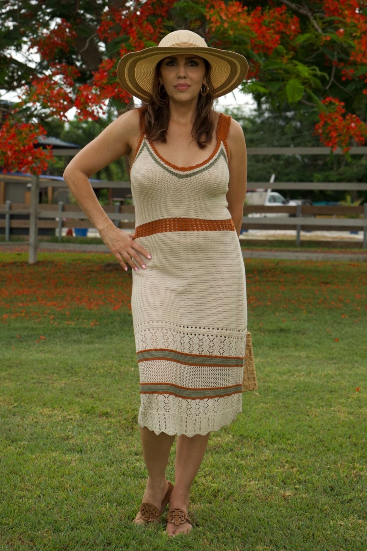 Crochet midi dress – front view, sleeveless cream knit with terracotta and olive trim.