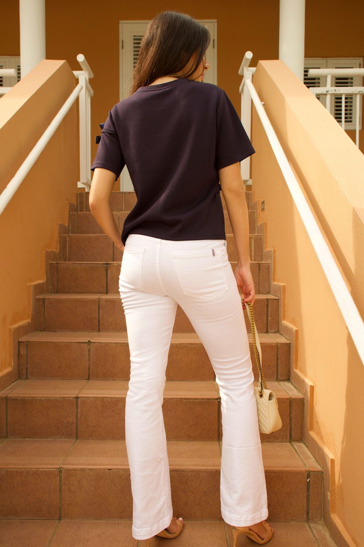 Navy Swirl Short Sleeve Top with Satin Bow Details - back view.