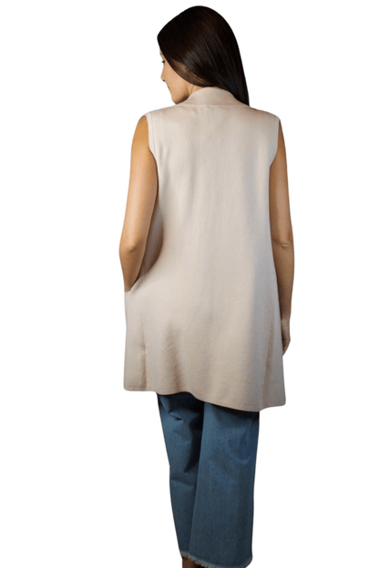 Back view of a women's ivory vest, highlighting its tailored fit and clean lines for a refined silhouette.