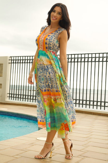 Front view of Natania Floral Maxi Dress – sleeveless, floral print, V-neck, and adjustable waist.
