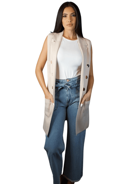 Front view of a women's ivory vest with gold buttons, showcasing its sleek design and sophisticated details for a polished look.
