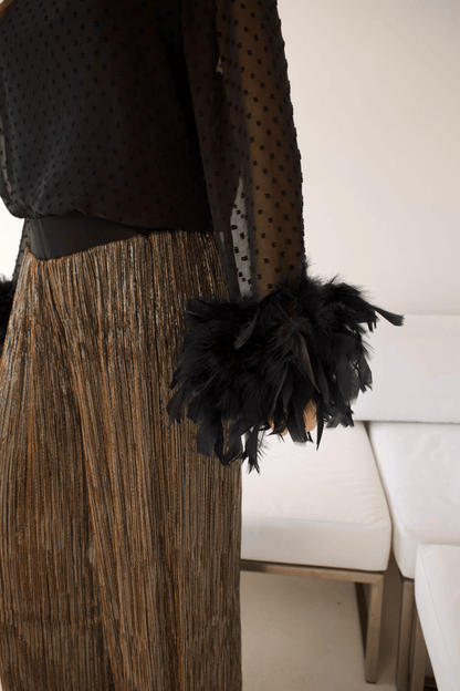 Close-up of the Women's Elegant Black Feather Trim Top highlighting the soft feather trim and high-quality fabric for a glamorous finish.