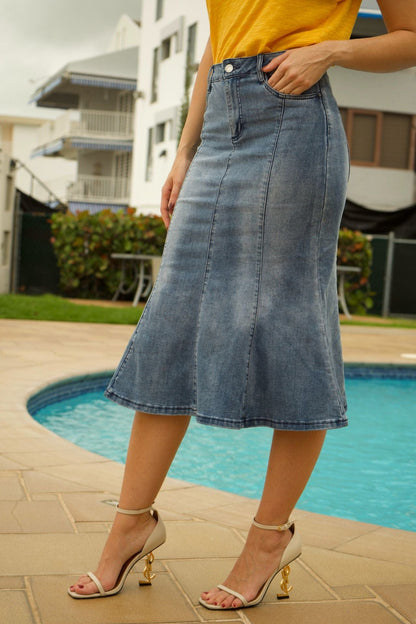 Close-up of front pockets and bell-shaped hem on Women's Light Denim Midi Skirt – combining style and practicality.