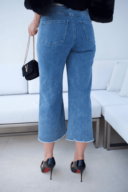 JEANS VINTAGE AZUL CON CIERRE ABIERTO Y UN TOQUE DE BRILLO