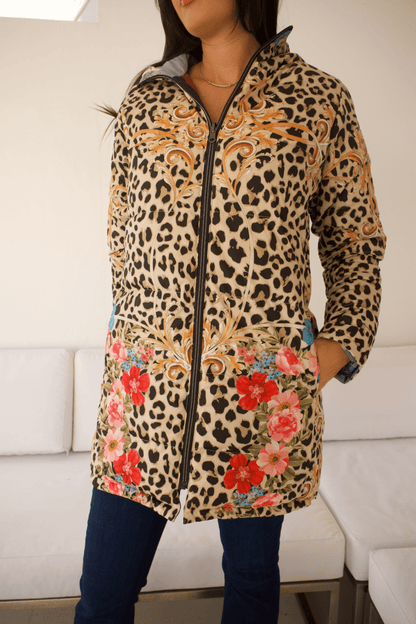 Close-up of the Reversible Down Parka Jacket showcasing the bold animal print design with intricate details and a smooth quilted texture.