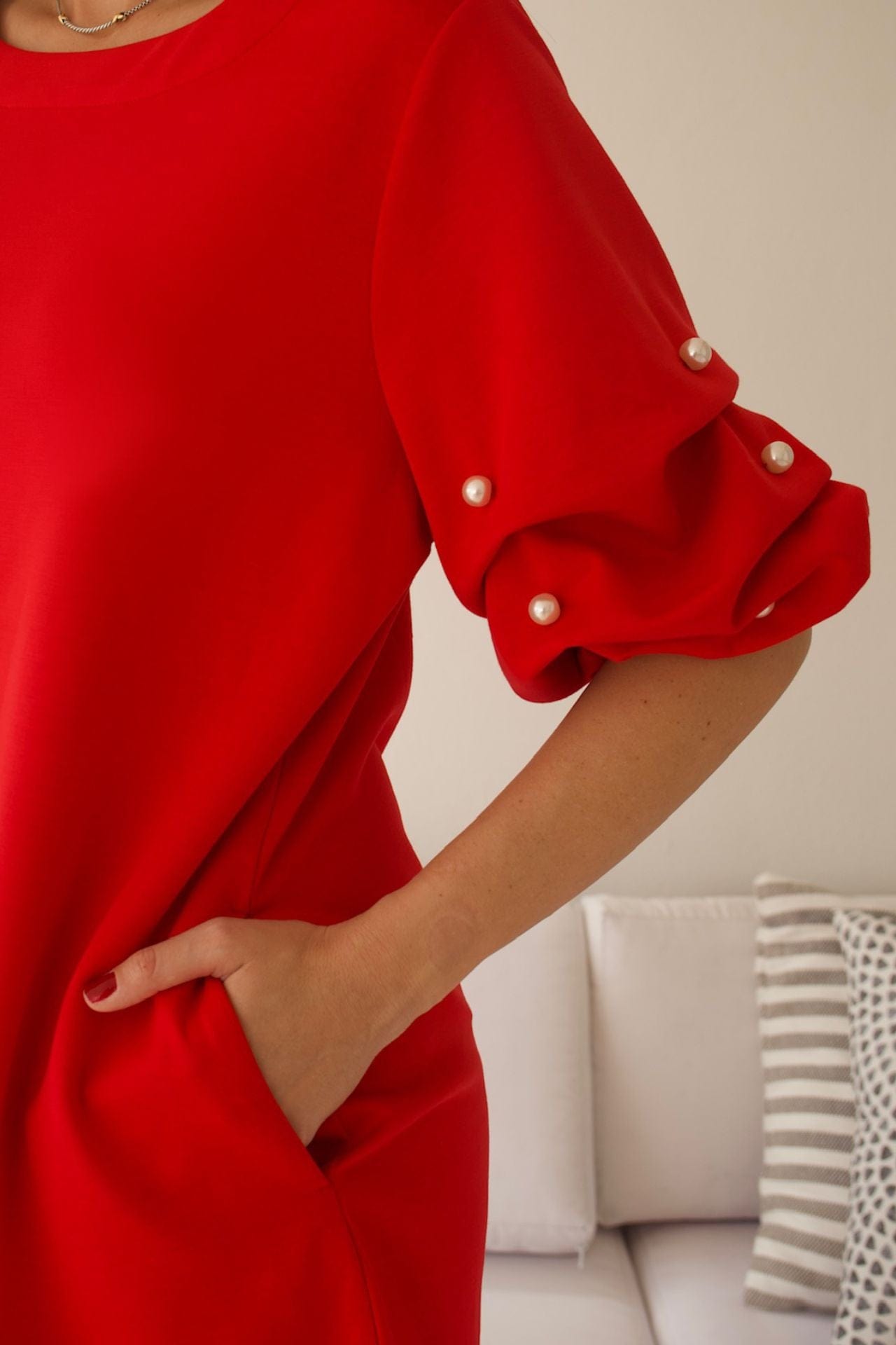 Chic pearl accents and soft volume in every detail.

