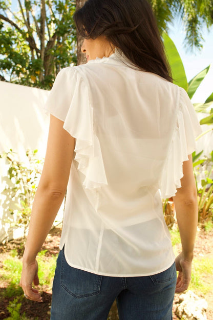 Back view of women's short sleeve chiffon blouse with relaxed fit.