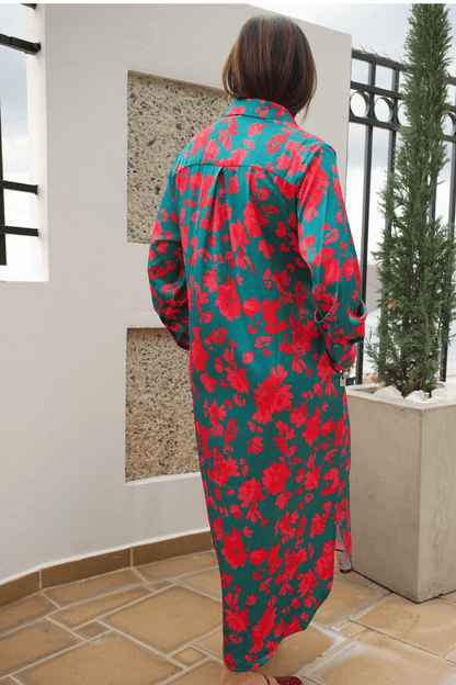 Back view of women's long sleeve green floral satin button-down maxi dress, offering a timeless and sophisticated look.