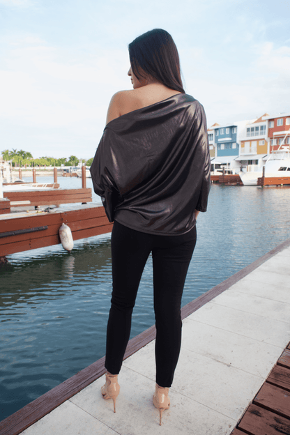 Back view of the Metallic Dots Jersey Off Shoulder Top showcasing a sleek design with metallic dots for added style