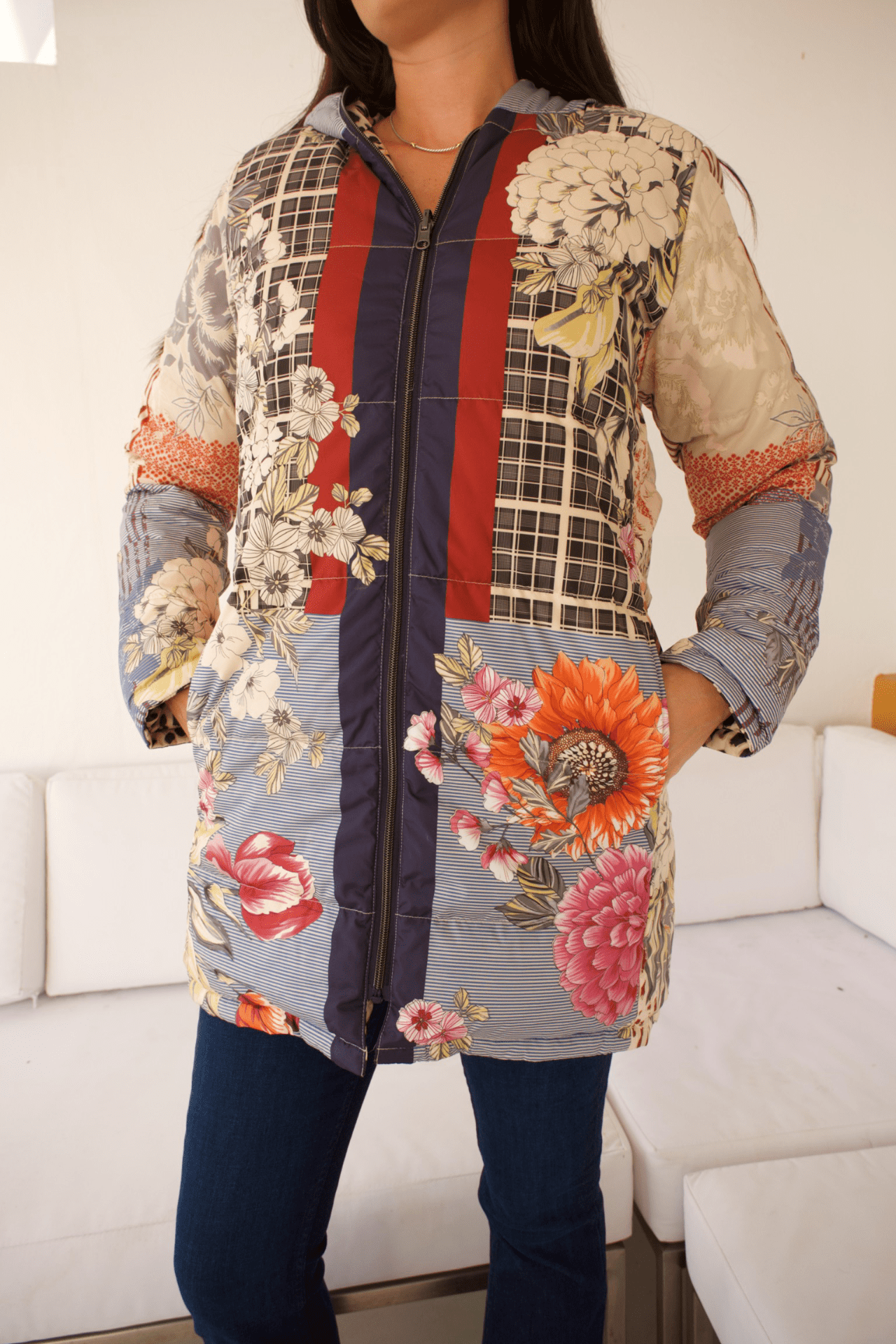 Close-up of the Reversible Down Parka Jacket highlighting the delicate floral pattern on the soft fabric, perfect for a feminine touch.