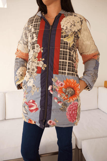 Close-up of the Reversible Down Parka Jacket highlighting the delicate floral pattern on the soft fabric, perfect for a feminine touch.