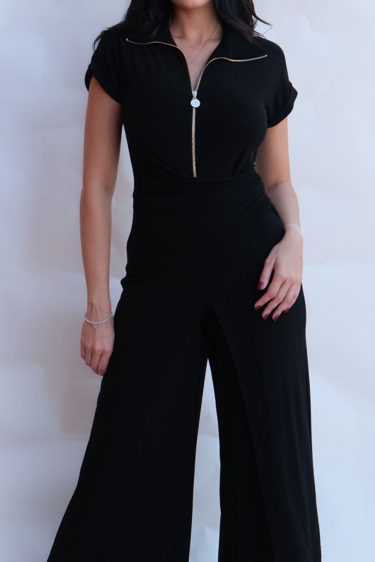 black draped zip front jumpsuit with wide leg silhouette elegant women outfit available online and in-store