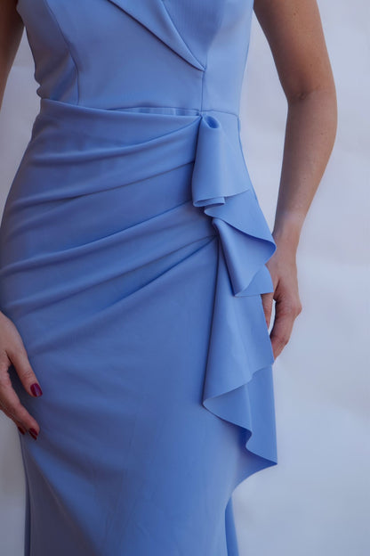 Celestial blue off-shoulder draped evening gown with fitted silhouette and floor length hem available online and in-store at Elegance Boutique