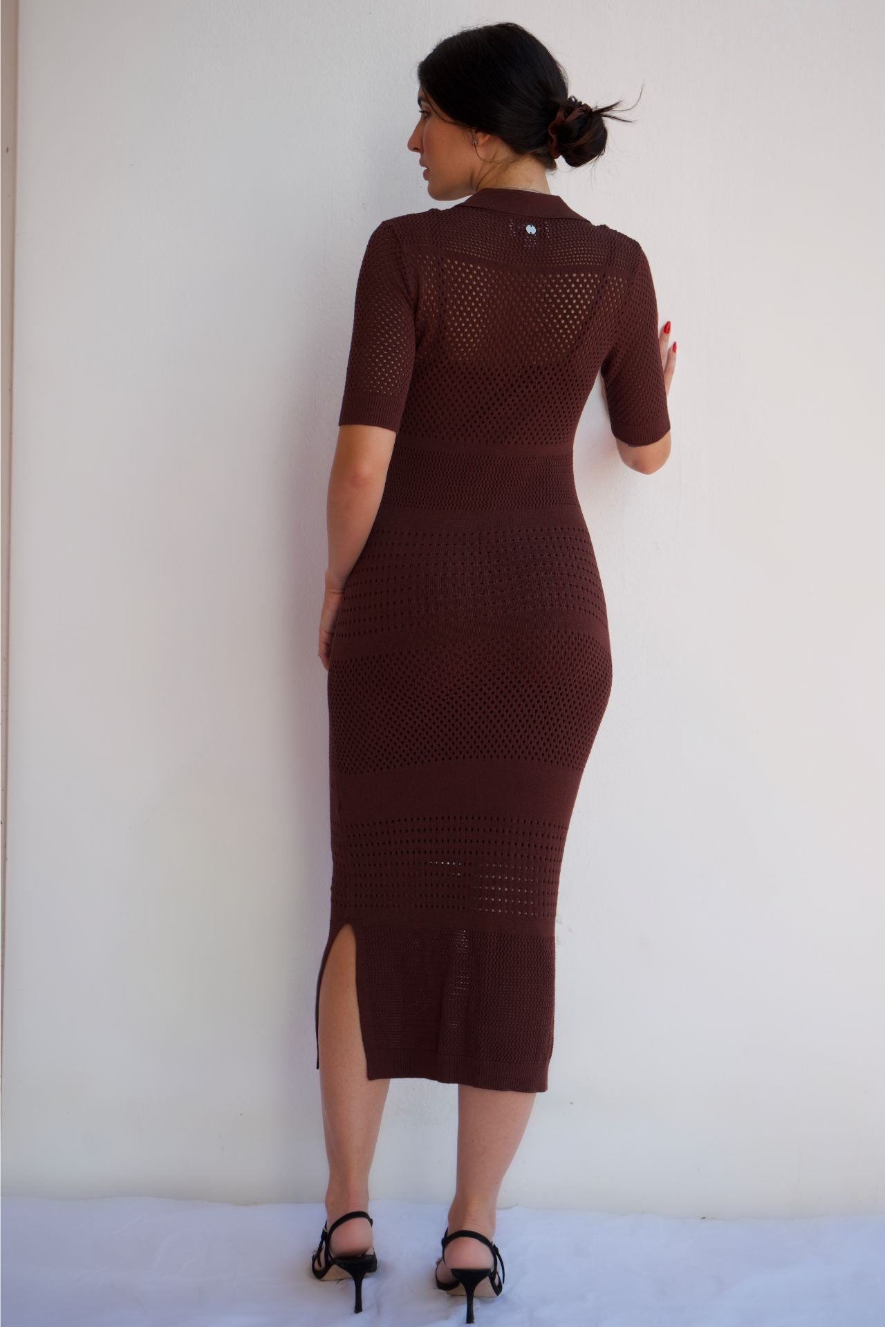 Chocolate textured knit midi dress with a flattering silhouette, styled for an elegant day-to-night look.