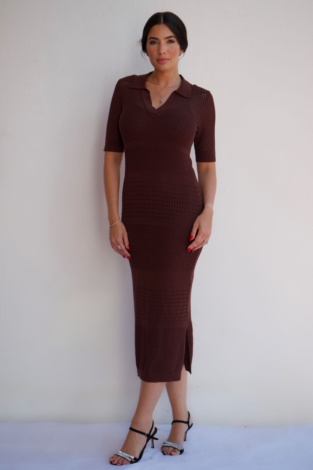 Chocolate textured knit midi dress with a flattering silhouette, styled for an elegant day-to-night look.