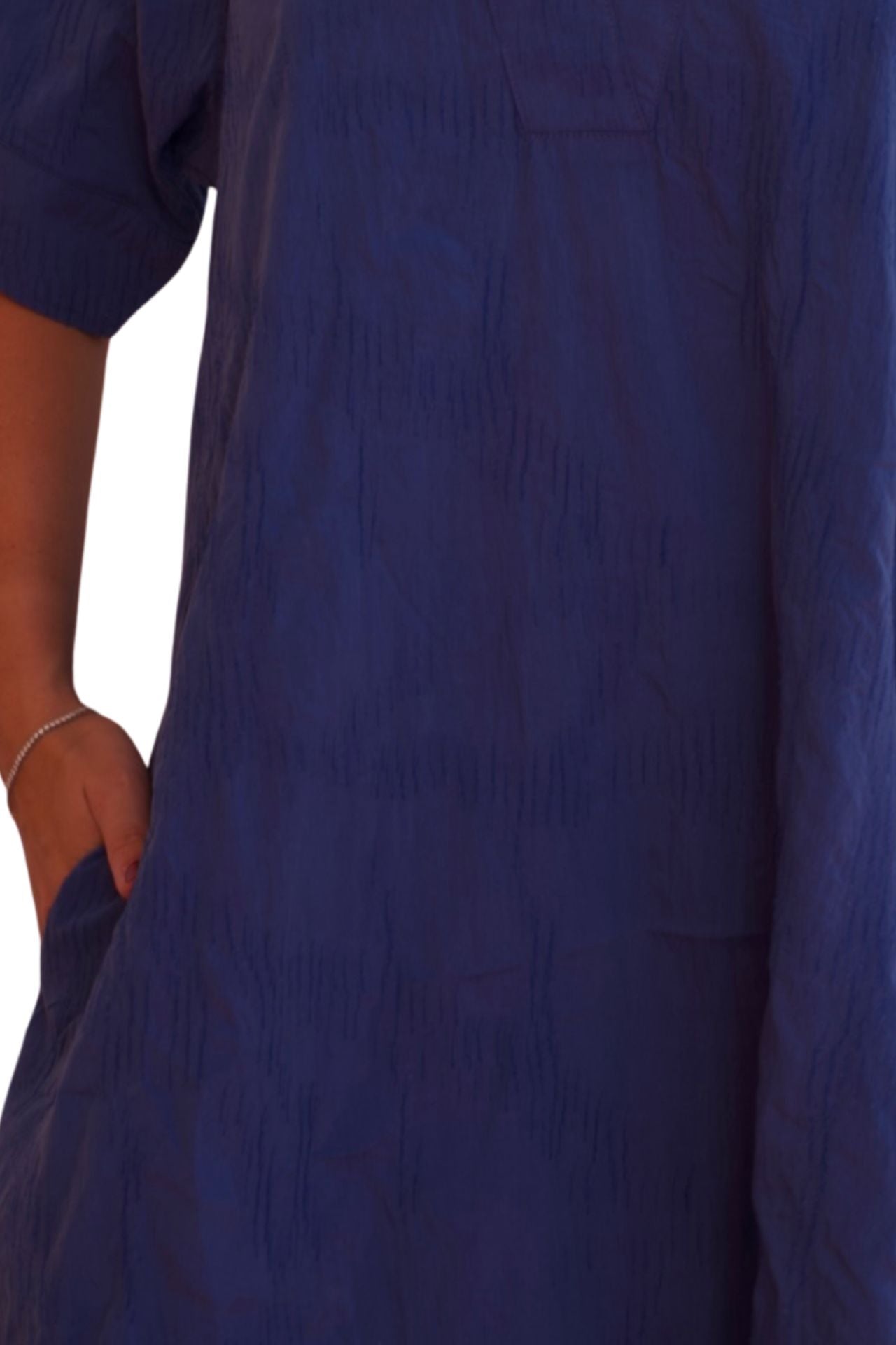 Blue midi shirt dress with relaxed fit and pockets, elegant casual day-to-night dress.