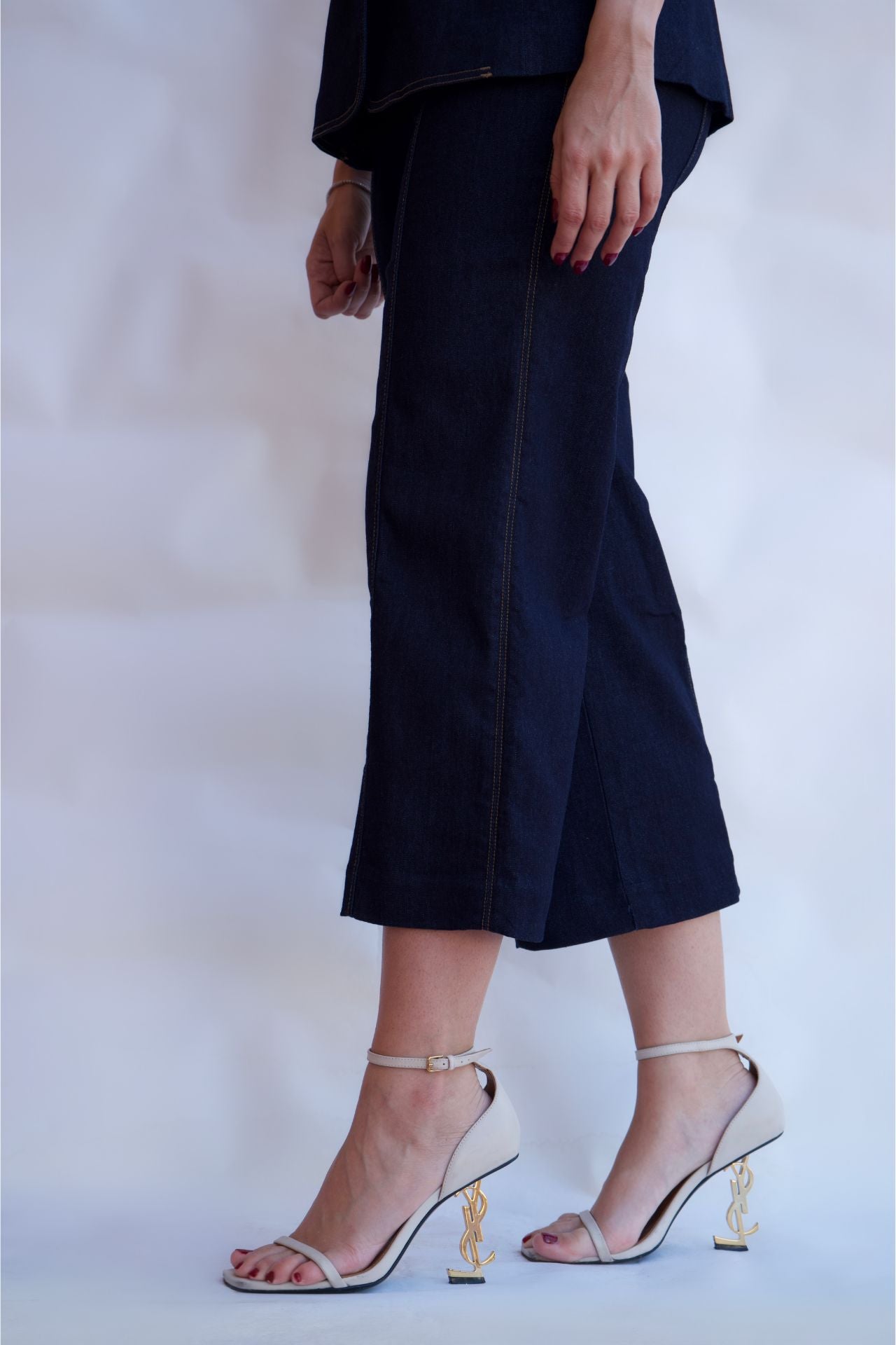 Dark denim cropped tailored pants with side zip closure available online and in-store