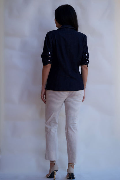 Dark denim tailored blazer with contrast stitching and single button closure available online and in-store