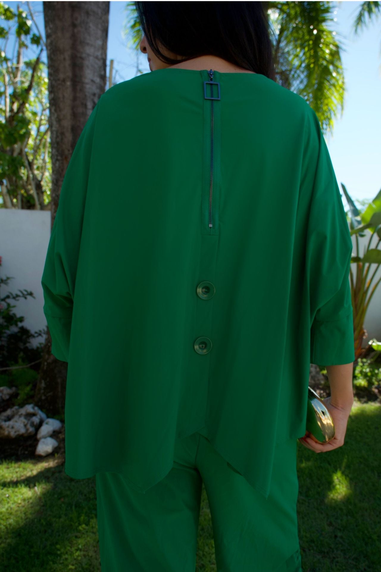 Emerald green ruched top and matching ruched-hem pant set — Elegance Boutique