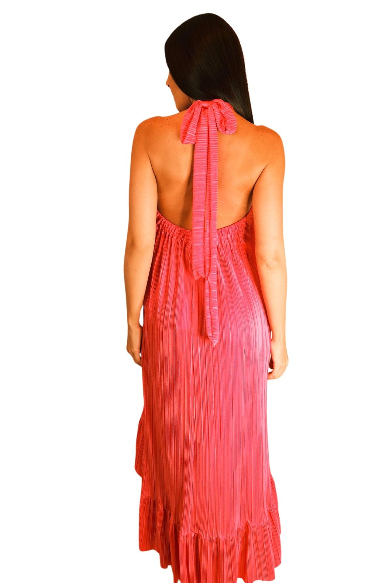Halter plissé high-low dress – back view, tie-neck halter strap and high-low silhouette.