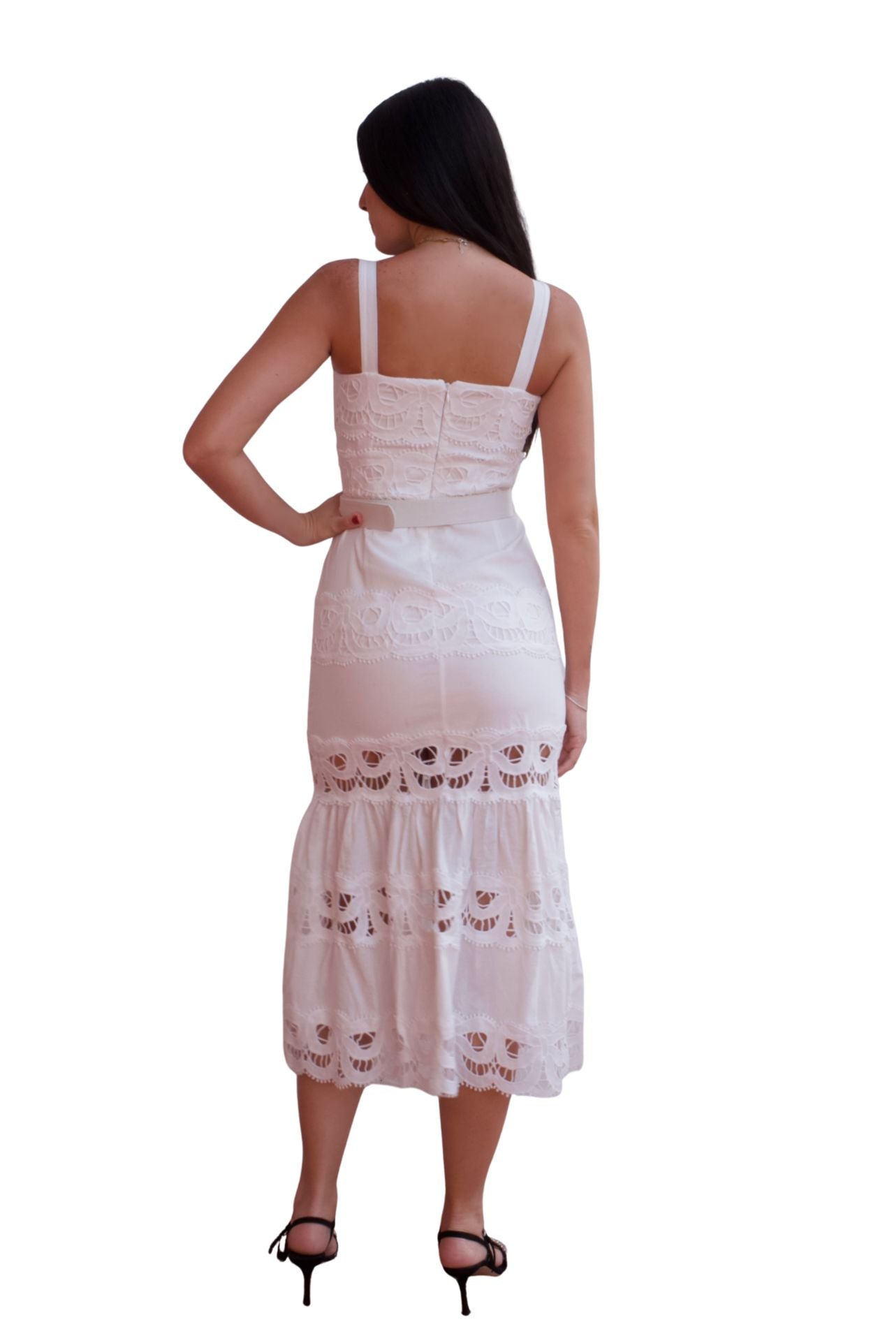 Woman wearing a lace detail belted maxi dress with ruffle hem in black and white.