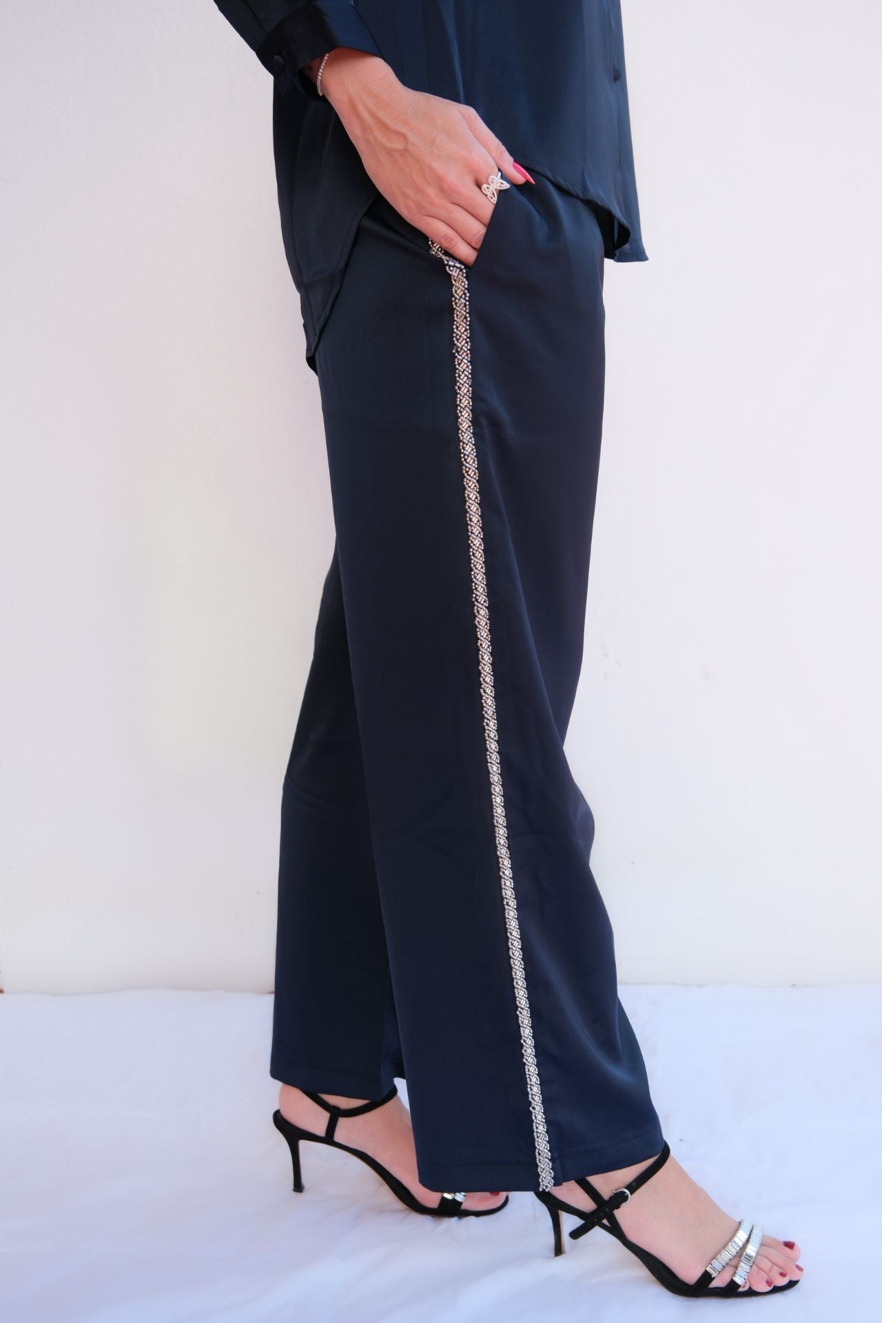 Navy two-piece set with crystal-embellished  pull-on pants with side pockets.