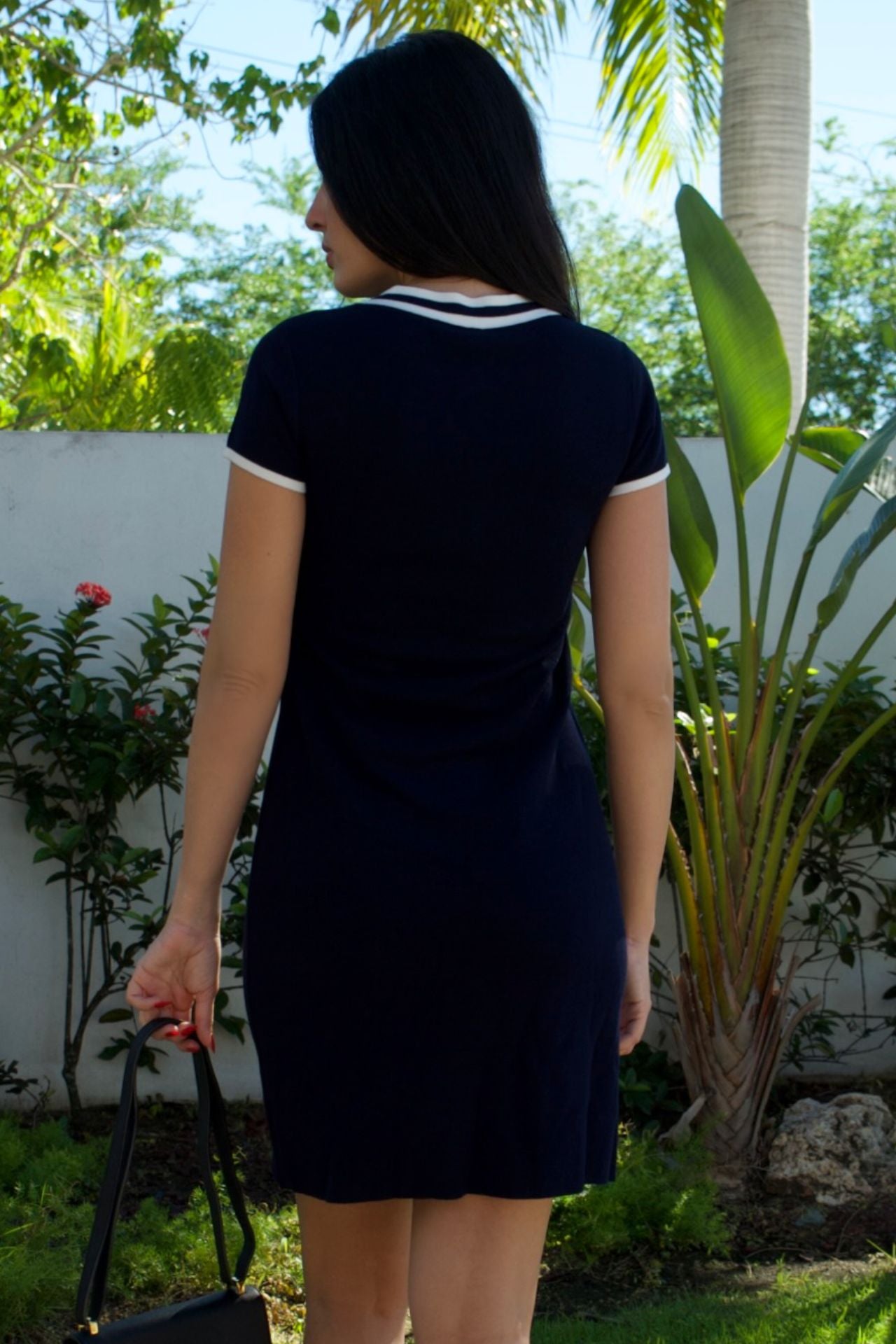 Navy day dress with white ribbed trim and front pockets