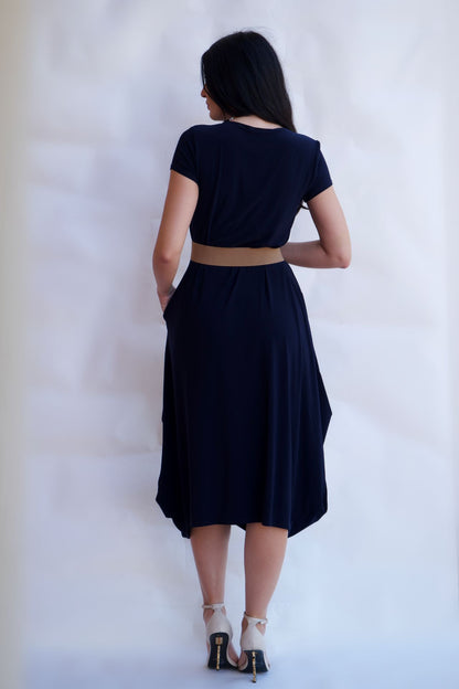 Navy wrinkle free travel midi dress styled with belt and heels available online and in-store