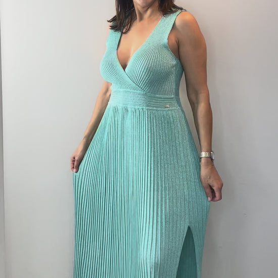 Model wearing Mint Shimmer Knit Midi Dress with elegant draping and subtle shimmer detail.