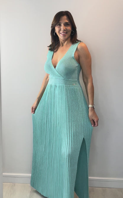 Model wearing Mint Shimmer Knit Midi Dress with elegant draping and subtle shimmer detail.