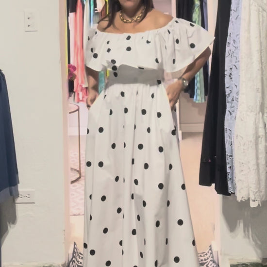 Monroe Polka Dress with off-the-shoulder ruffle, black polka dots and flowing cotton maxi silhouette