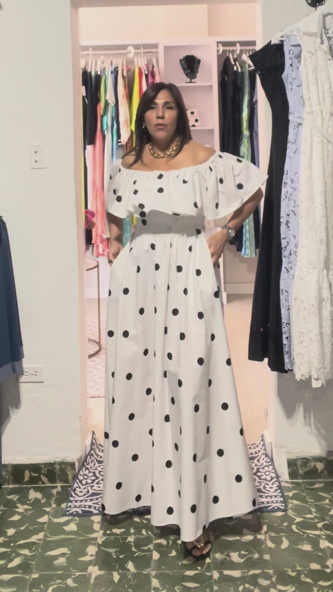 Monroe Polka Dress with off-the-shoulder ruffle, black polka dots and flowing cotton maxi silhouette