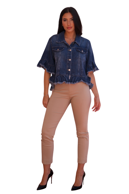 Cropped denim jacket with ruffle hem and button front, feminine and stylish layering piece perfect for dresses and casual chic outfits.