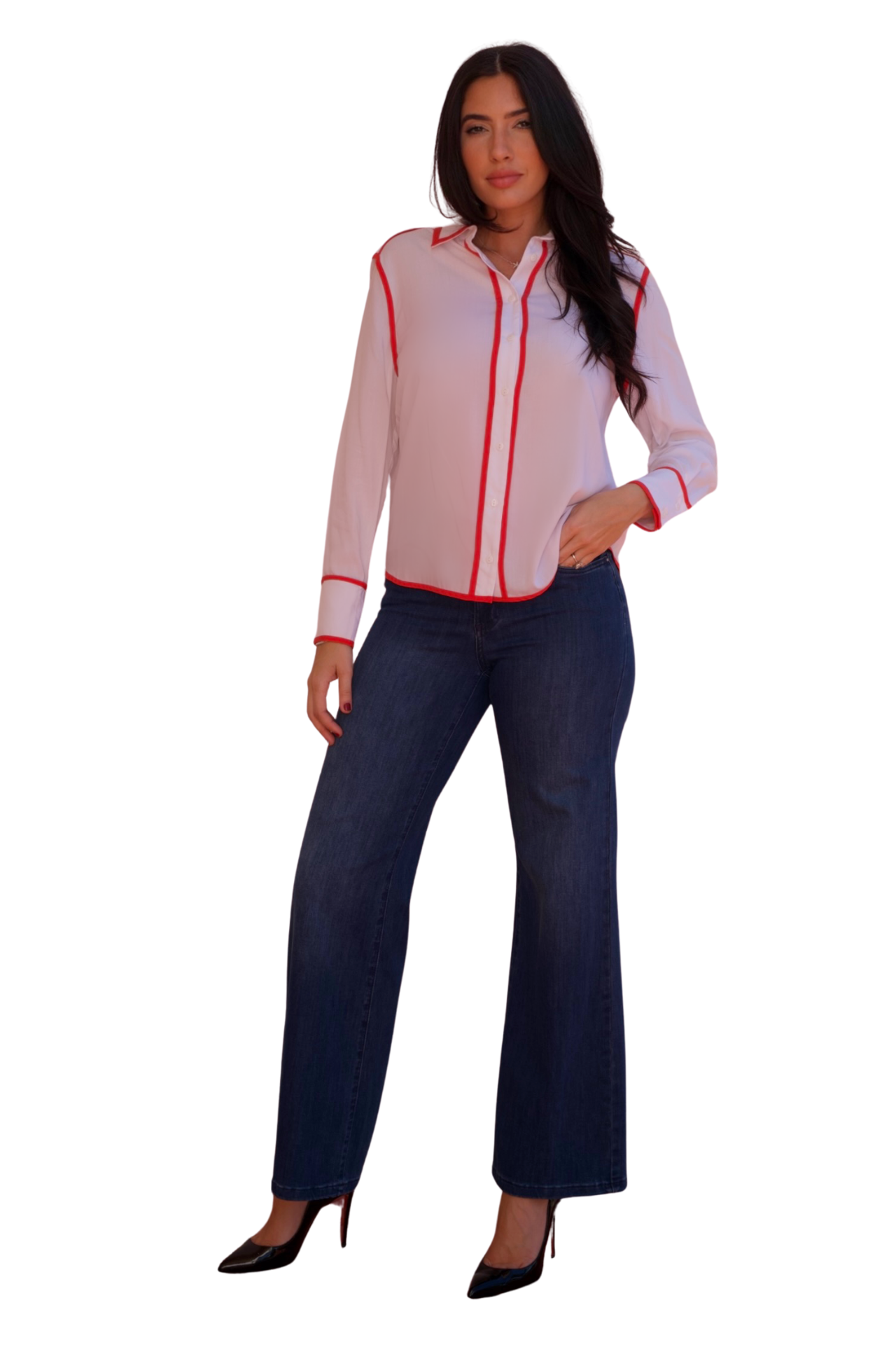 Model wearing a white long sleeve blouse with tangerine trim detail and button-front design.