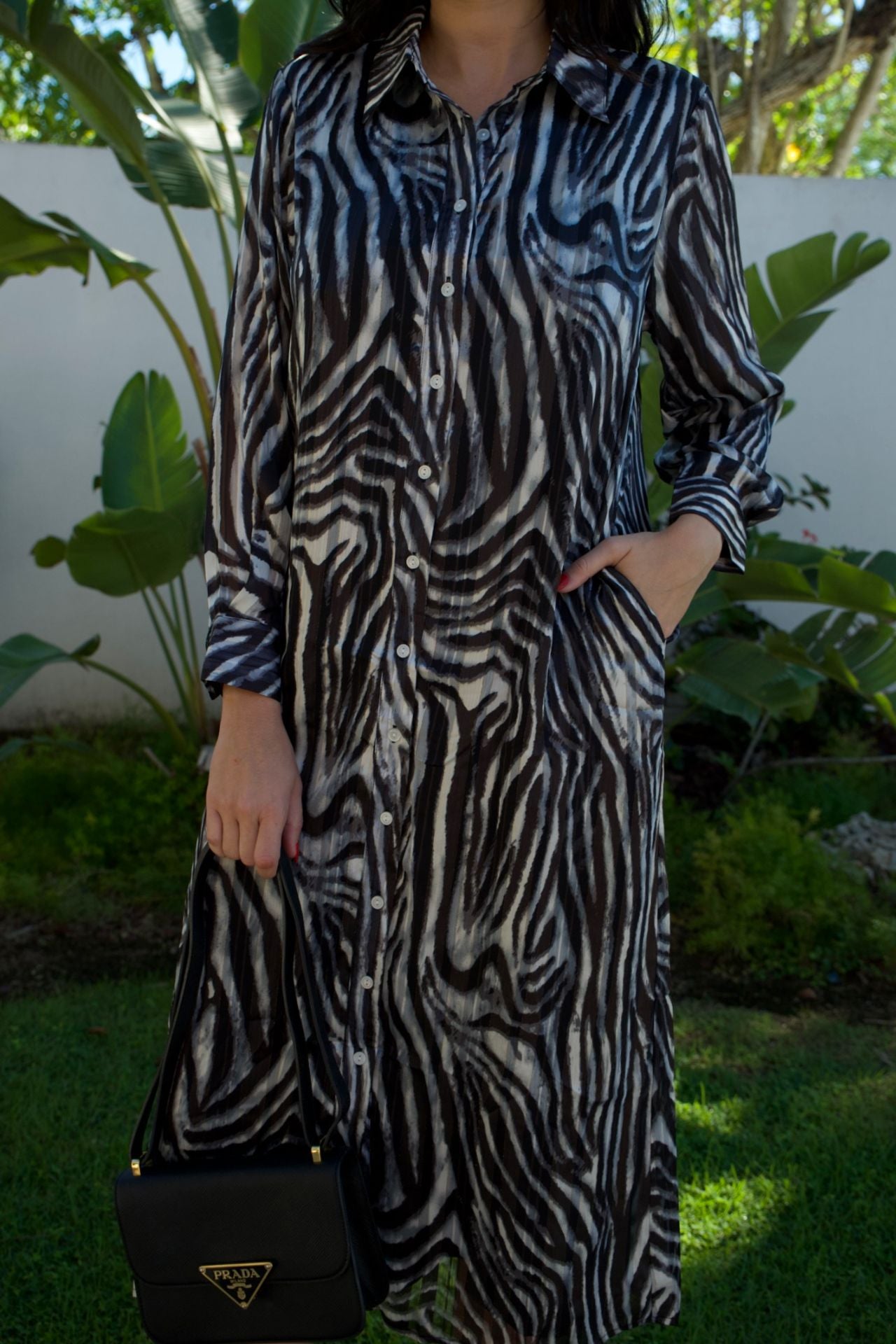 Zebra print satin long-sleeve maxi dress with gold accents — runs large, Elegance Boutique